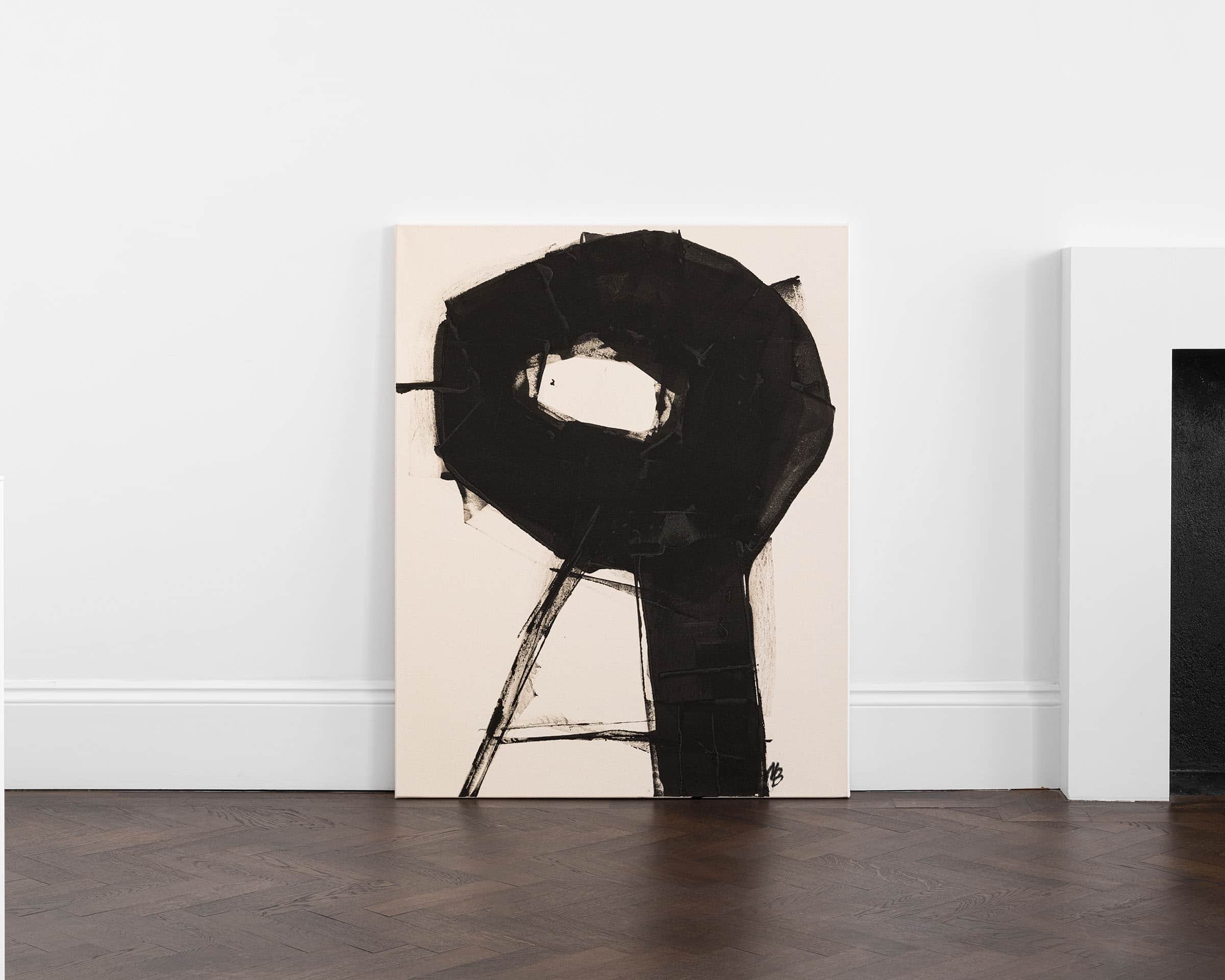 A bold black and white painting with a circle.